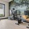 a room with exercise equipment and a tv