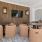 a room with a couch and chairs